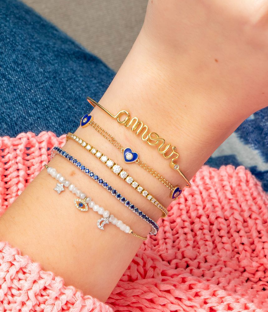 Pulseira-coracoes-de-ouro-com-diamantes-e-esmalte