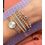 pulseira-signo-carolina-bucci-de-seda-com-ouro-amarelo-e-madreperola pulseira-signo-carolina-bucci-de-seda-com-ouro-amarelo-e-madreperola