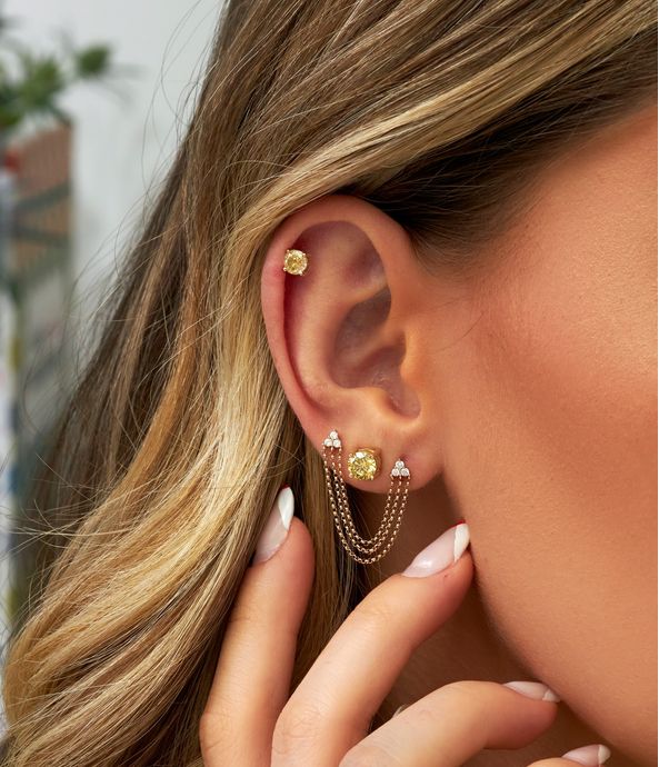 brinco-unico-com-corrente-de-ouro-com-diamantes