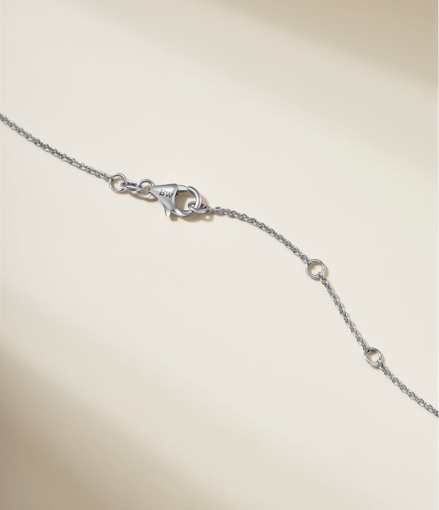 colar-riviera-tennis-necklace-de-ouro-branco-com-diamantes-brilhantes-e-turmalina-verde