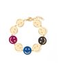 pulseira-smile-de-ouro-com-rubis-safiras-diamantes-negros