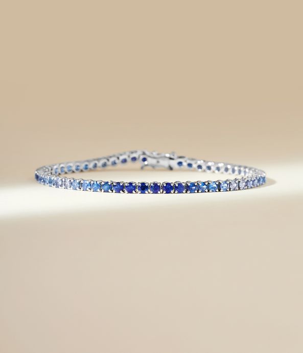 pulseira-riviera-tennis-bracelet-de-ouro-branco-com-degrade-de-safiras-azuis