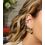 piercing-conch-fake-de-ouro-com-esmeraldas