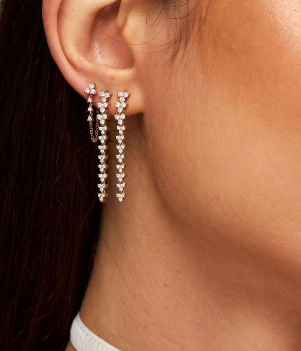 brinco-com-corrente-unico-de-ouro-com-diamantes